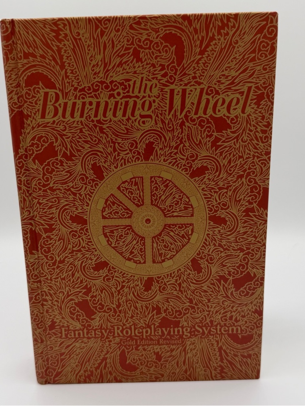 The Burning Wheel Fantasy Roleplaying System - Red & Gold Cover